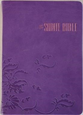 Bible de couleur parme avec des motifs arabesques concaves