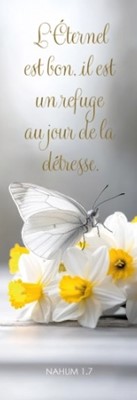 Marque-pages papillon posé sur des fleurs blanches et jaune