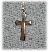 Pendentif argenté petite croix