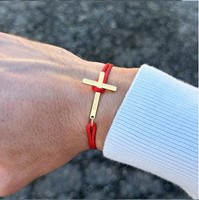 Bracelet croix inox dorée