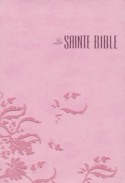 Bible de couleur rose avec des motifs arabesques concaves